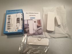 Door and window sensor set with manual and packaging.