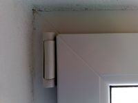 Plastic Double-Leaf Window (Movable Mullion): Wind Whistling & Blowing at Hinge, Upper Left Corner