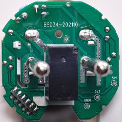 Image of the interior of an electronic plug with visible circuit components and marking BSD34-202110.
