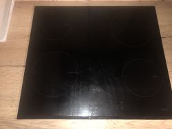 Indukcja Beko HII64205 - pęknięte szkło, możliwość zabezpieczenia, ryzyko zwarcia