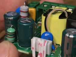 Close-up of an open surface-mounted thermostat showing internal electronics and WBR3 WiFi module.
