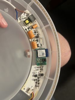 Disassembly of Anslut LED Lamp with BK7231T Chipset Interior of a disassembled LED lamp showing the electronic circuitry and a chipset BK7231T board.