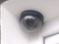 Neighbor's surveillance camera invades privacy: how to legally blind/block the view