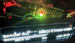 Radio display with ESP32 player and electronic components.