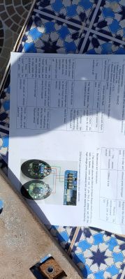 Installation guide with instructions and photos of electronic components.