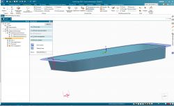 Interfejs Solid Edge z modelem tacki.