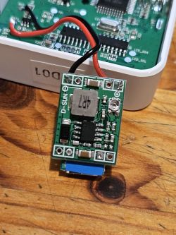 PCB with a female USB-C connector soldered to a DC voltage regulator.