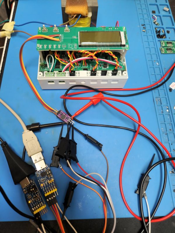 Interior of a Three-Phase Energy Meter Three-phase energy meter with exposed casing and connected wires.