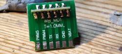 Close-up of a PCB with connector labels.