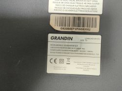 Identification label of a Grandin LD40CHG1061ES TV with technical details.