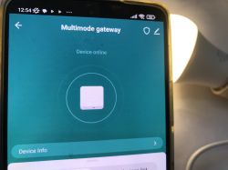 Tuya App with Multimode Gateway Close-up of a phone with the Tuya app showing a multimode gateway.