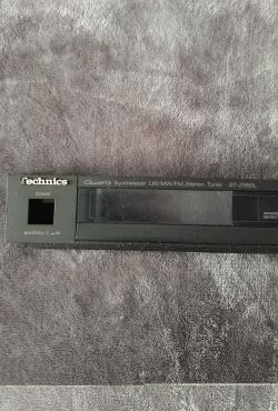 Front panel of Technics ST-Z980L tuner with power button and LCD screen