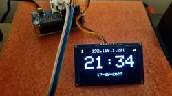 OLED display showing time and IP address, connected to Raspberry Pi