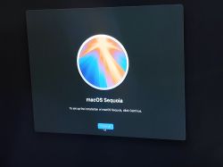 macOS Sequoia Installation Screen macOS Sequoia installation screen with Continue button.