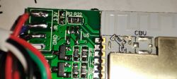 Close-up of a circuit board with visible traces and electronic components.