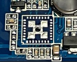 Multilayer printed circuit board with T34 chip and electronic components.