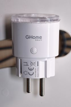 White GHome Smart plug with a power button, placed against a white background.