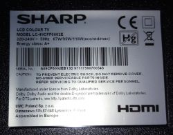 Sharp LC-49CFF6002E TV label with technical specifications and serial number