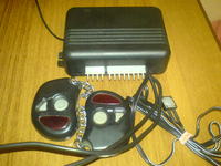 Alarm AMT Forteca - Jak podłączyć zasilanie i otwieranie drzwi z pilota?