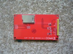 Red 3.5 TFT SPI 480×320 module PCB with microSD slot and labeled pin header.