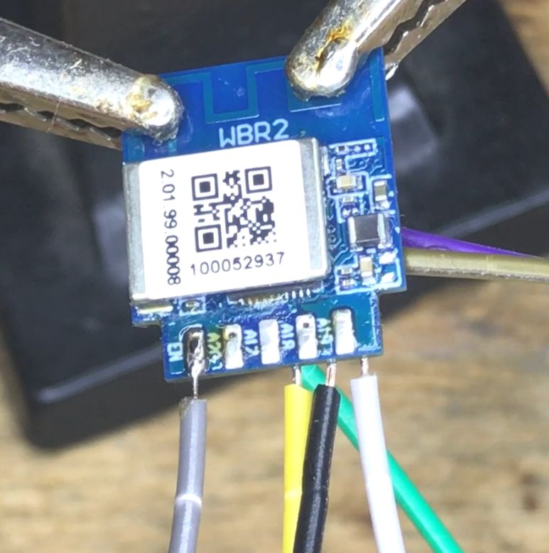 WBR2 Module Ready for Flashing Tuya WBR2 module with connected wires for flashing.