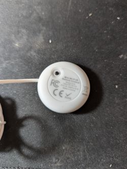 Back of a white device labeled Mini Wi-Fi IR Remote Control with technical specifications.