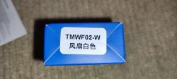 Top view of a blue box labeled TMWF02-W with Chinese characters.