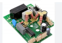 Printed circuit board with relay, resistors, and capacitors; a gray rectangular component is visible