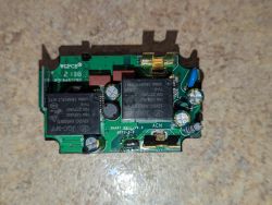 Close-up of the interior of the YSW102 smart socket electronic module.