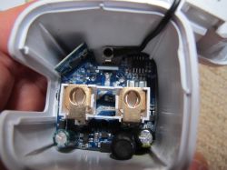 Interior of Farylink Smart Plug Interior of the Farylink smart plug with visible electronics and components on the PCB.