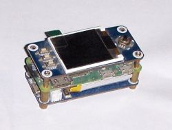 Small electronic module consisting of a display and PCB, assembled in layers.