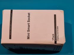 Mini Smart Socket Box Box with the label Mini Smart Socket on a blue background.