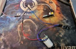 Preparing Equipment for LED Bulb Flashing Electronic components and wires on a printed mat.