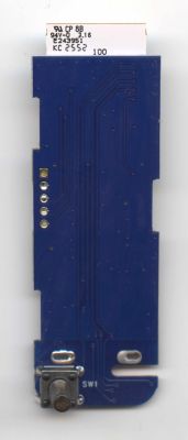 Blue PCB with printed traces and a mechanical push button labeled SW1, top-down view.