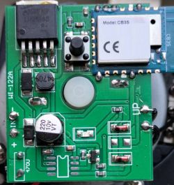 Close-up of a PCB with a TO‑220 power IC, a push button, and a “Model: CB3S” module with CE marking.