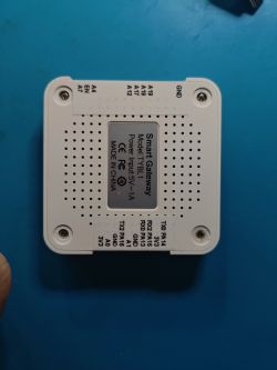 View of the Smart Gateway TYBL1 device from the bottom, with port labels and power indication.