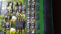 Close-up of a power supply board with visible electronic components.