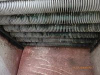 Immergas Combi Oven: Frequent Cleaning Needed Due to Green-White Precipitate on Heat Exchanger