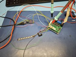 Control board prototype with components and wiring Soldered prototype board with connected wires and measurement probes
