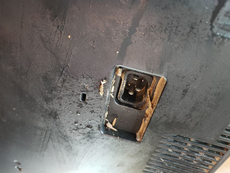 Power Connector of Flood-Damaged TV Power connector of a flood-damaged TV with visible silt deposits.