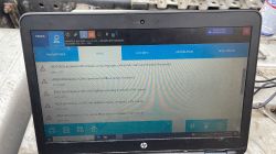 Vehicle Diagnostics with TEXA Software Laptop with TEXA diagnostic software displaying error codes related to the AdBlue system.
