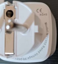 Plug Casing with Model MT1000 Marking White plug casing with model MT1000 and voltage specification 90-250V.