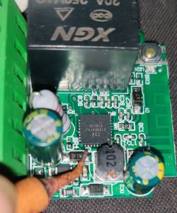 Electronic circuit with capacitors and soldered copper wire.