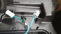 Close-up of a wiring harness with three connectors in an AdBlue tank