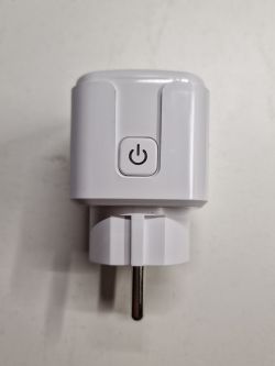 Smart Plug with Power Button White smart plug with a power button on the top.