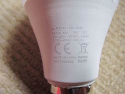 Close-up of a Wi-Fi LED bulb with technical information on the casing.