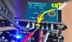 CB2S Module with Soldering Points Labels Close-up of CB2S module with soldering points labeled VDD, GND, RX, TX, and CEN, indicating where to cut the RX trace.