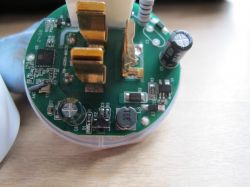 Interior of the RMC003 Smart Plug Inner view of the RMC003 smart plug with visible components on the PCB.