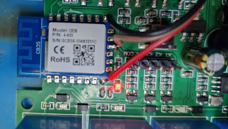 CB3S module on relay board with a red debugging wire connected