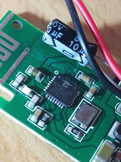 Circuit Board with BL602 Chip Close-up of a small circuit board with a BL602 chip and a capacitor.